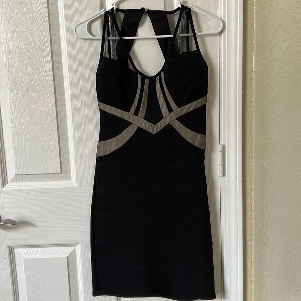 Crystal doll, size juniors 7, never worn, black and tan dress